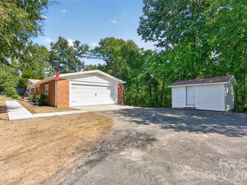 4501 Flowes Store Road, Concord, NC 28025.  MLS# CAR4429896, YatesRealty ID 56705. Garage exterior