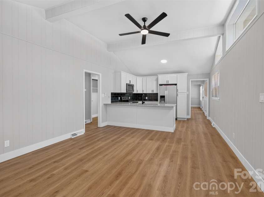 4501 Flowes Store Road, Concord, NC 28025.  MLS# CAR4429896, YatesRealty ID 56705. Kitchen and Family Room