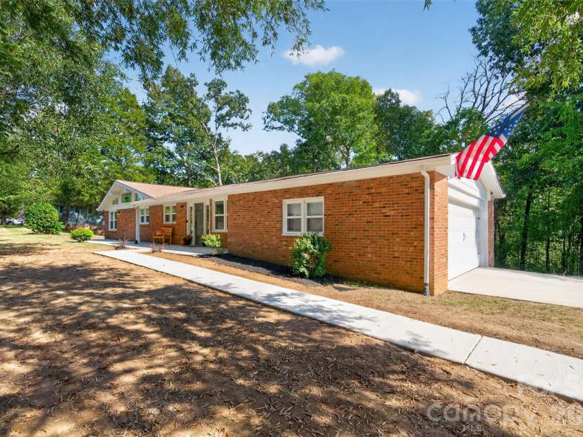 4501 Flowes Store Road, Concord, NC 28025.  MLS# CAR4429896, YatesRealty ID 56705. Rightside exterior