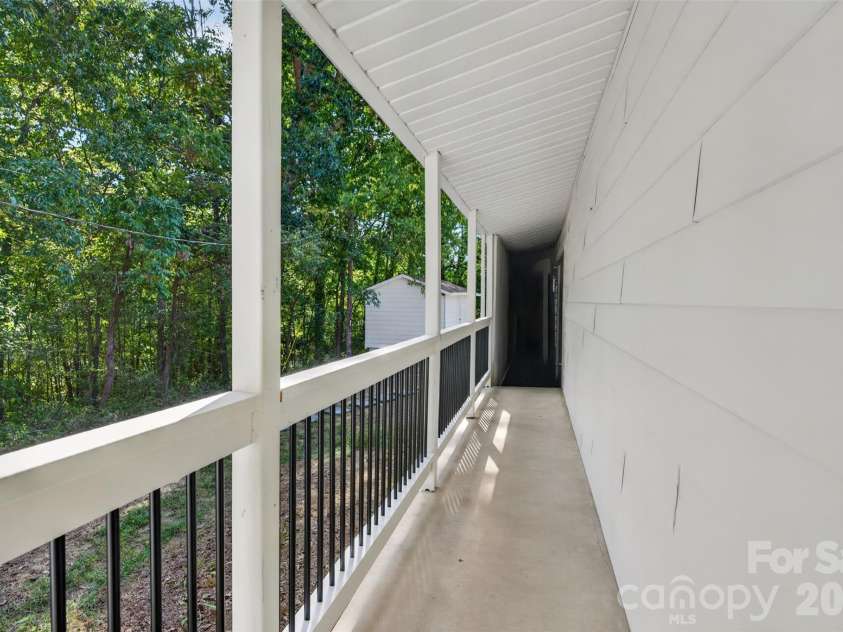 4501 Flowes Store Road, Concord, NC 28025.  MLS# CAR4429896, YatesRealty ID 56705. Walkway