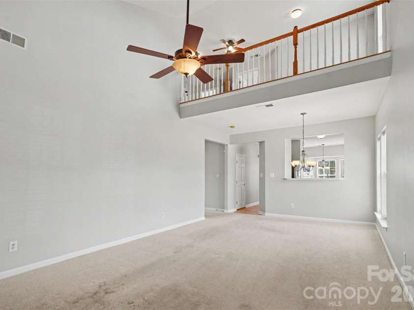 4083 Holly Villa Circle, Indian Trail, NC 28079.  MLS# CAR4434442, YatesRealty ID 56712. Loft overlooking Living Room