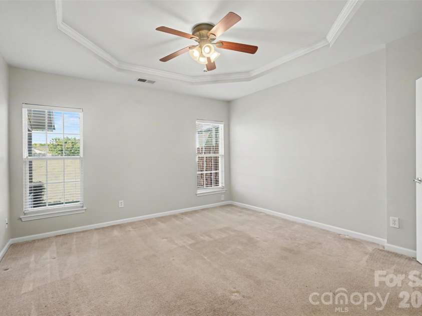 4083 Holly Villa Circle, Indian Trail, NC 28079.  MLS# CAR4434442, YatesRealty ID 56712. Main level primary bedroom with trey ceiling