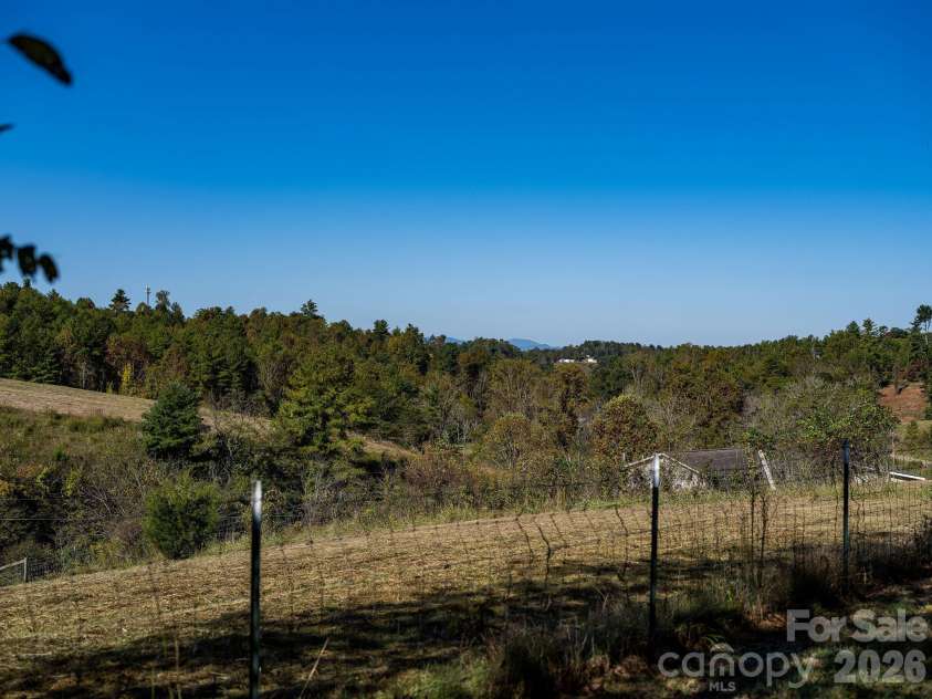 69 Allman Hill Road, Weaverville, NC 28787.  MLS# CAR4432493, YatesRealty ID 56721. A barely-Fall view