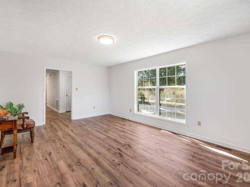 69 Allman Hill Road, Weaverville, NC 28787.  MLS# CAR4432493, YatesRealty ID 56721. Another LR perspective