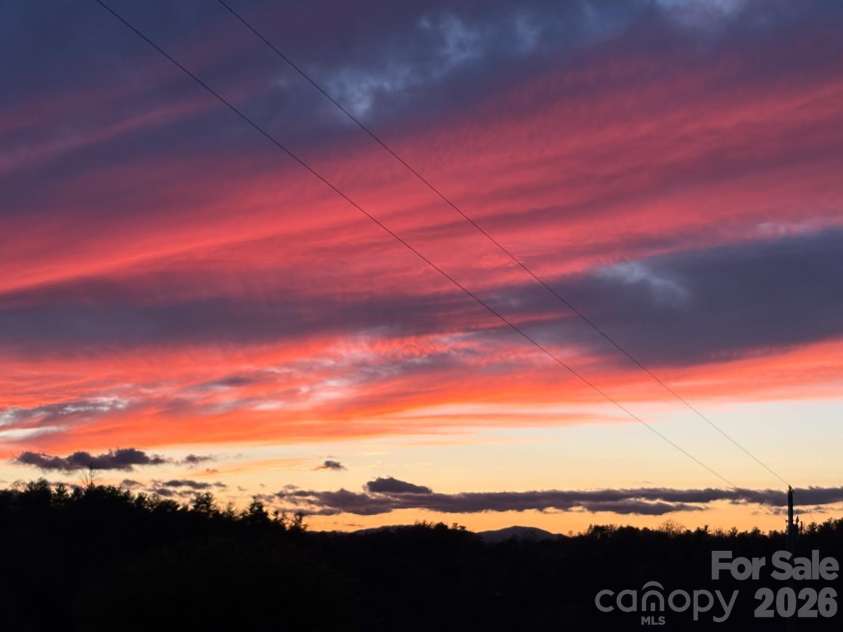 69 Allman Hill Road, Weaverville, NC 28787.  MLS# CAR4432493, YatesRealty ID 56721. Gorgeous sunsets