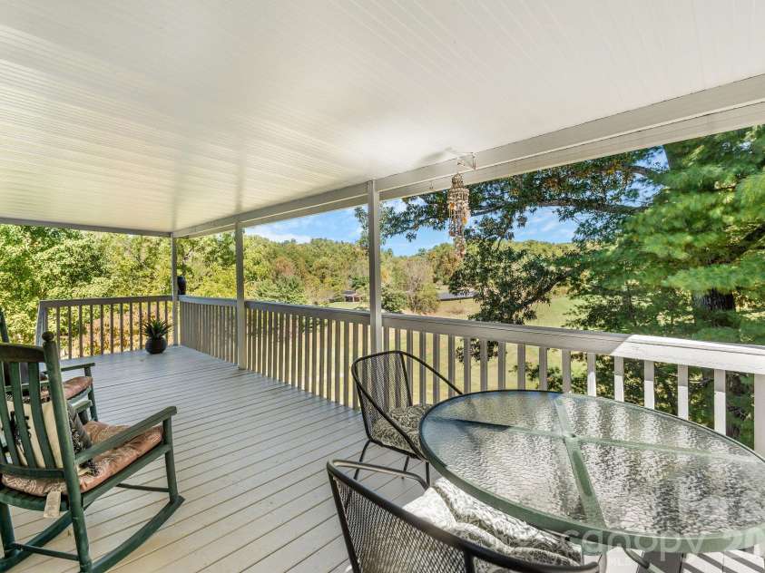 69 Allman Hill Road, Weaverville, NC 28787.  MLS# CAR4432493, YatesRealty ID 56721. Large rear covered porch