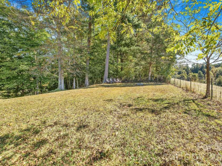 69 Allman Hill Road, Weaverville, NC 28787.  MLS# CAR4432493, YatesRealty ID 56721. Level front yard