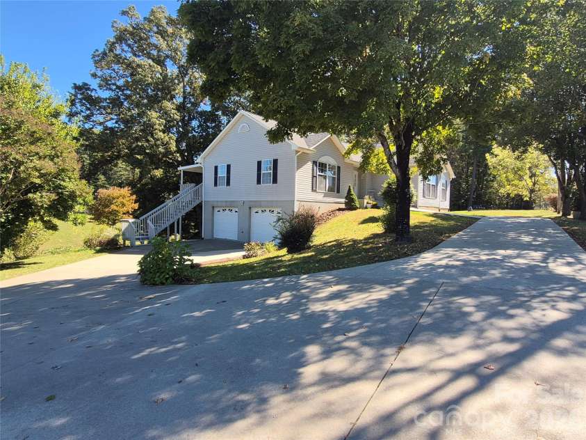 69 Allman Hill Road, Weaverville, NC 28787.  MLS# CAR4432493, YatesRealty ID 56721. Notice the wrap-around driveway
