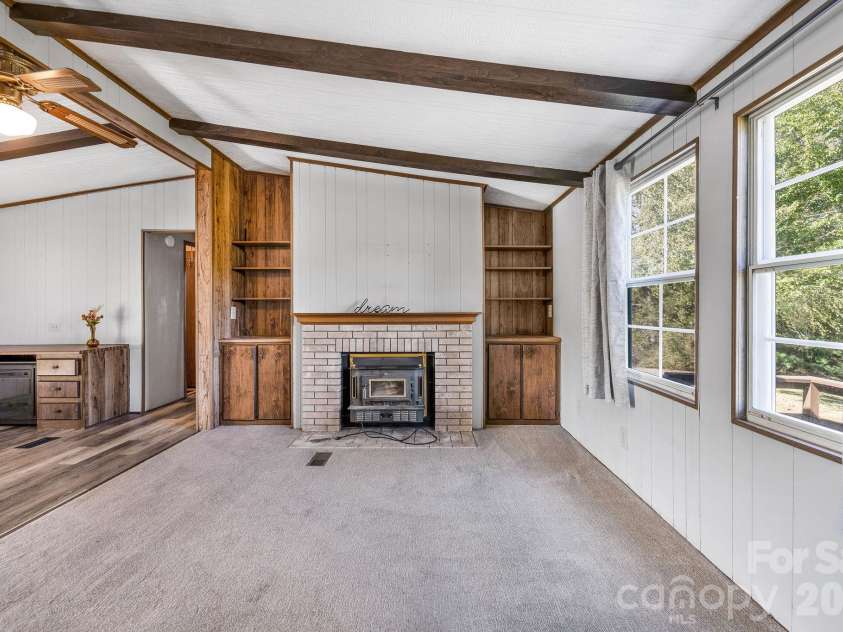 67 Allman Hill Road, Weaverville, NC 28787.  MLS# CAR4432359, YatesRealty ID 56723. Large windows