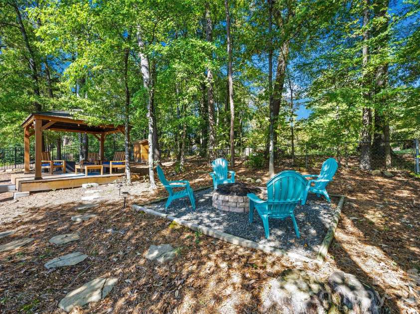 1718 Sanridge Wind Lane, Charlotte, NC 28262.  MLS# CAR4434366, YatesRealty ID 56724. Back Yard