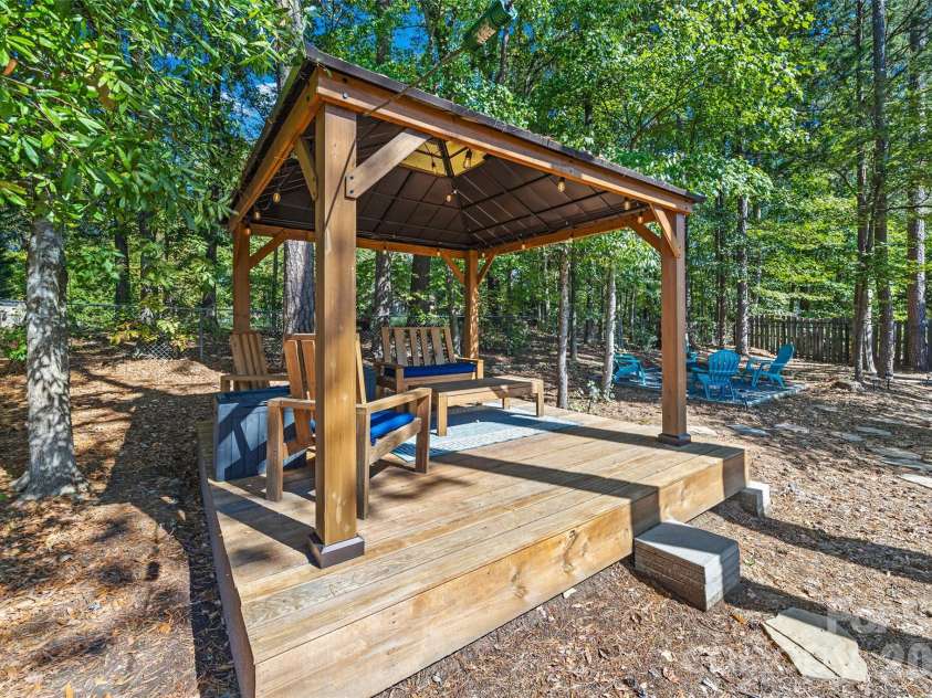 1718 Sanridge Wind Lane, Charlotte, NC 28262.  MLS# CAR4434366, YatesRealty ID 56724. Back Yard Pergola Area