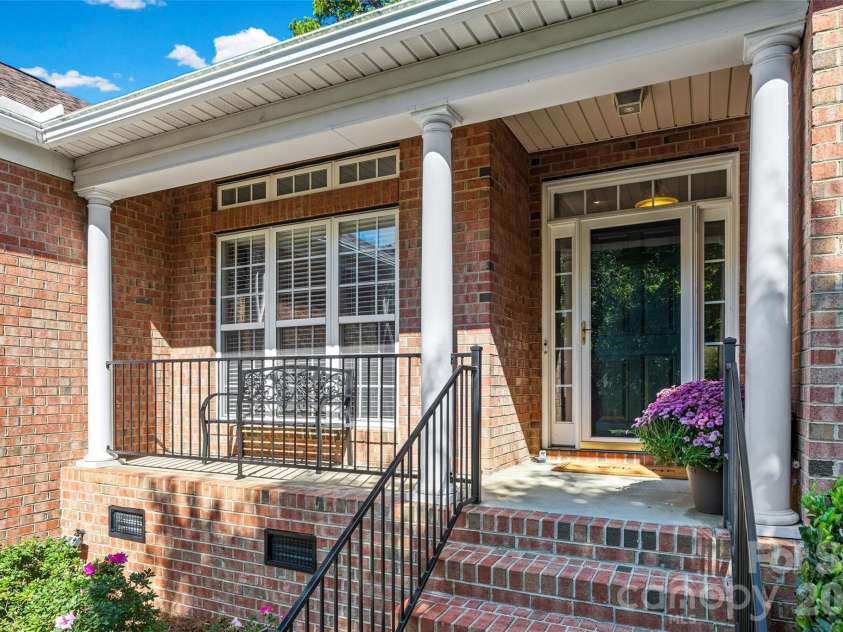 1718 Sanridge Wind Lane, Charlotte, NC 28262.  MLS# CAR4434366, YatesRealty ID 56724. Charming Front Porch
