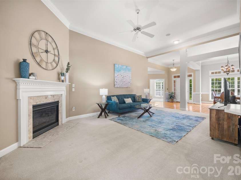 1718 Sanridge Wind Lane, Charlotte, NC 28262.  MLS# CAR4434366, YatesRealty ID 56724. Great Room with gas fireplace