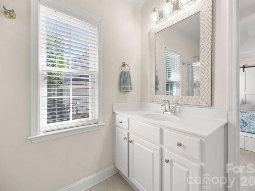 1718 Sanridge Wind Lane, Charlotte, NC 28262.  MLS# CAR4434366, YatesRealty ID 56724. Primary Bathroom