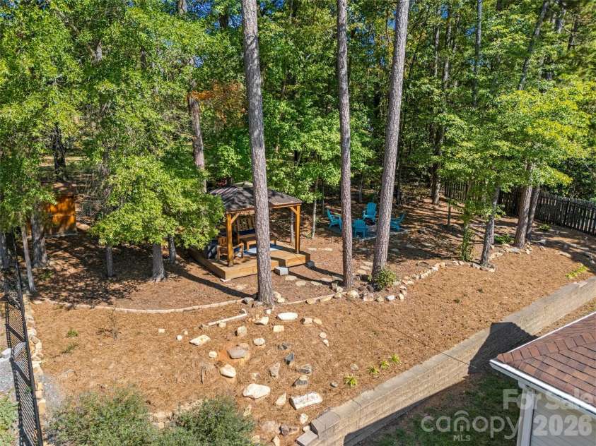 1718 Sanridge Wind Lane, Charlotte, NC 28262.  MLS# CAR4434366, YatesRealty ID 56724. Rear Yard