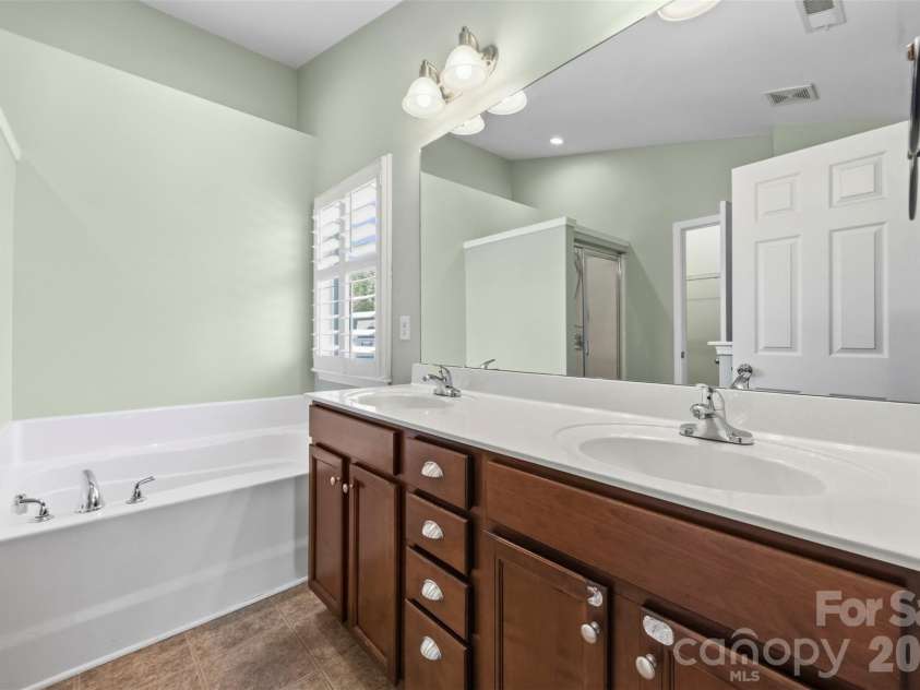 108 Moores Branch Road, Mount Holly, NC 28120.  MLS# CAR4434163, YatesRealty ID 56725. Primary bathroom