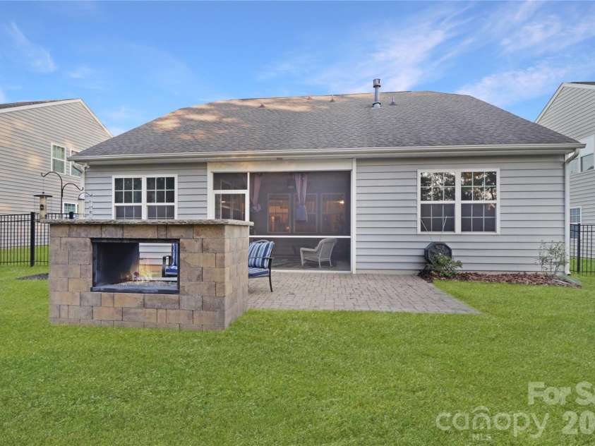 1929 Napa Valley Drive, Waxhaw, NC 28173.  MLS# CAR4434691, YatesRealty ID 56729. Paver Patio with Fireplace