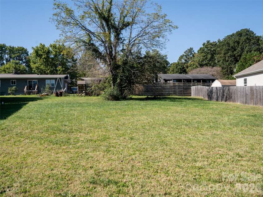 33 Sherman Meadows Drive, East Flat Rock, NC 28726.  MLS# CAR4423057, YatesRealty ID 56736. Large Side Yard