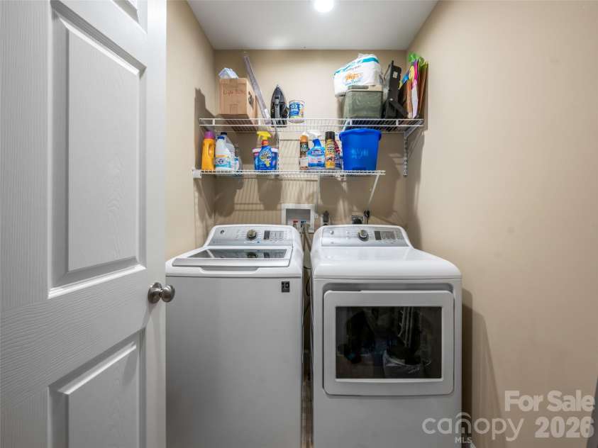33 Sherman Meadows Drive, East Flat Rock, NC 28726.  MLS# CAR4423057, YatesRealty ID 56736. Main Level Laundry