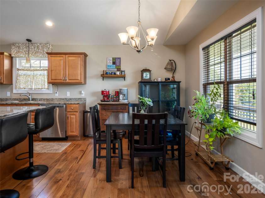 33 Sherman Meadows Drive, East Flat Rock, NC 28726.  MLS# CAR4423057, YatesRealty ID 56736. Open Concept Dining Area/Kitchen