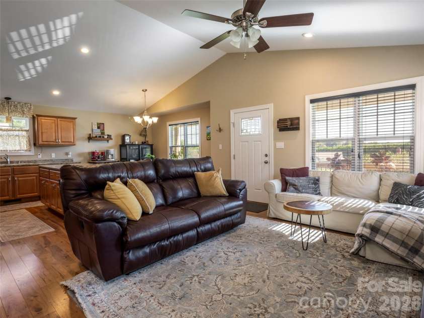 33 Sherman Meadows Drive, East Flat Rock, NC 28726.  MLS# CAR4423057, YatesRealty ID 56736. Open Concept Living Room/Dining Room/Kitchen