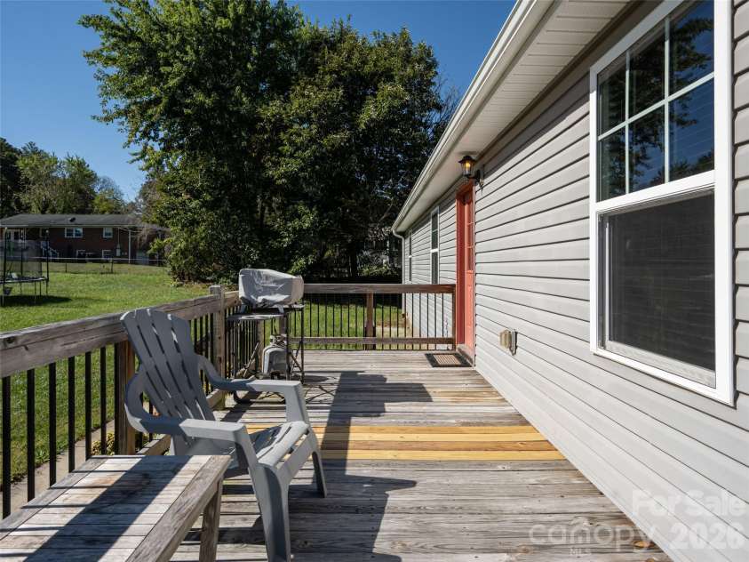 33 Sherman Meadows Drive, East Flat Rock, NC 28726.  MLS# CAR4423057, YatesRealty ID 56736. Side Deck