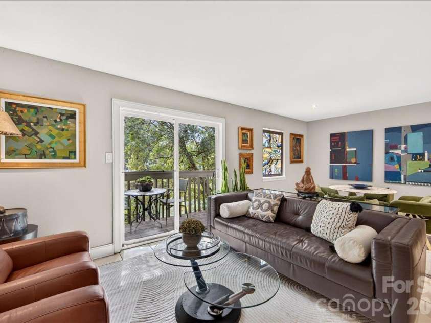 3762 Winding Creek Lane, Charlotte, NC 28226.  MLS# CAR4434831, YatesRealty ID 56737. Balcony off Main Level Living Room