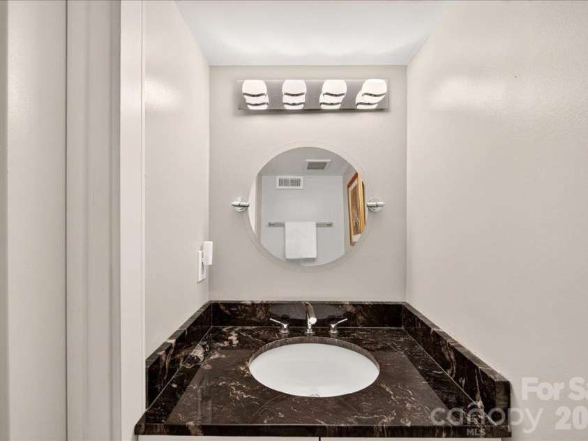 3762 Winding Creek Lane, Charlotte, NC 28226.  MLS# CAR4434831, YatesRealty ID 56737. Main Floor Powder Room
