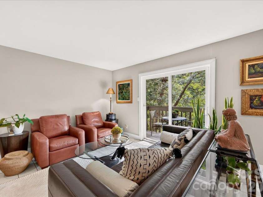 3762 Winding Creek Lane, Charlotte, NC 28226.  MLS# CAR4434831, YatesRealty ID 56737. Open Living Room with Balcony