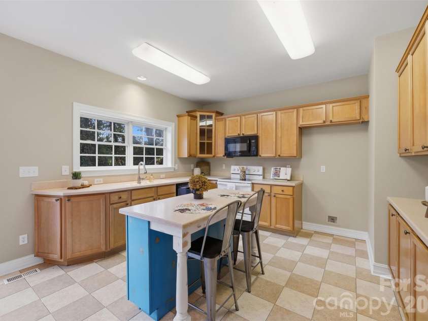 151 Robertson Drive, Taylorsville, NC 28681.  MLS# CAR4433721, YatesRealty ID 56738. Kitchen with Island