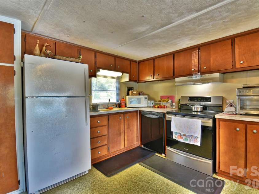1026 Pinehaven Drive, Badin Lake, NC 28127.  MLS# CAR4434497, YatesRealty ID 56741. 