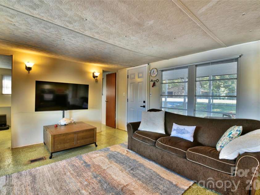 1026 Pinehaven Drive, Badin Lake, NC 28127.  MLS# CAR4434497, YatesRealty ID 56741. 