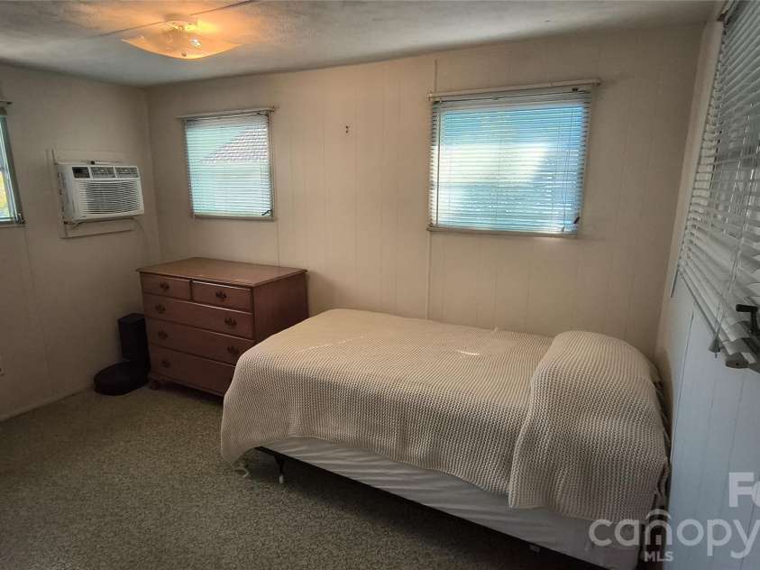 1026 Pinehaven Drive, Badin Lake, NC 28127.  MLS# CAR4434497, YatesRealty ID 56741. 