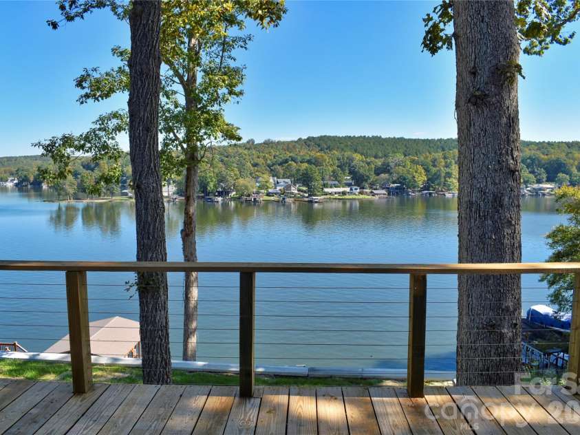 1026 Pinehaven Drive, Badin Lake, NC 28127.  MLS# CAR4434497, YatesRealty ID 56741. Lakefront deck.