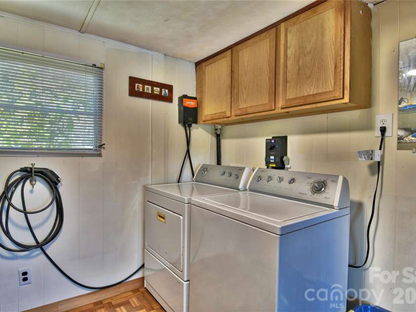 1026 Pinehaven Drive, Badin Lake, NC 28127.  MLS# CAR4434497, YatesRealty ID 56741. Laundry room.