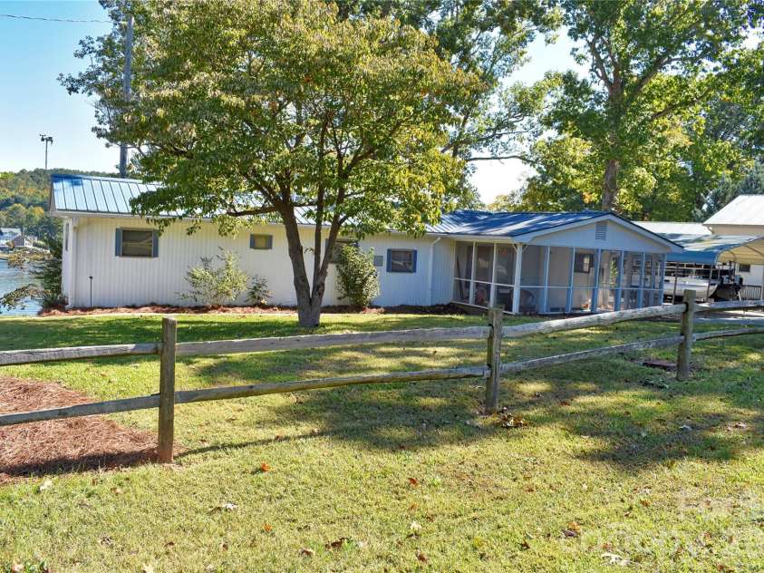 1026 Pinehaven Drive, Badin Lake, NC 28127.  MLS# CAR4434497, YatesRealty ID 56741. Roadside.