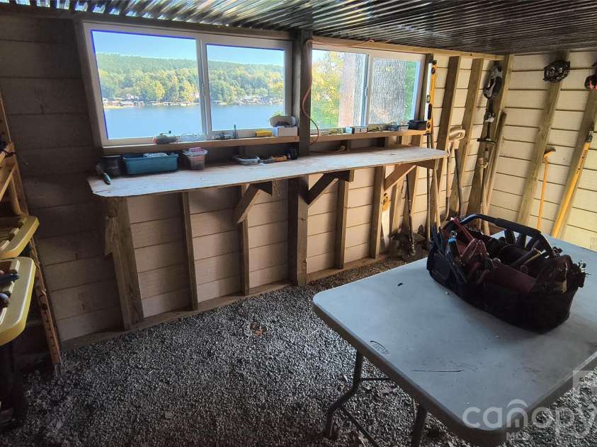 1026 Pinehaven Drive, Badin Lake, NC 28127.  MLS# CAR4434497, YatesRealty ID 56741. Workshop with a view.