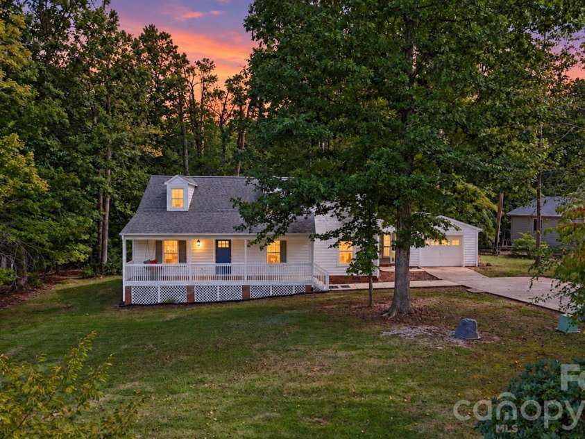 11538 Gelding Drive, Charlotte, NC 28215.  MLS# CAR4422682, YatesRealty ID 56750. Cape cod on large lot sits off the street on a quiet culdesac (digital twilight edit)