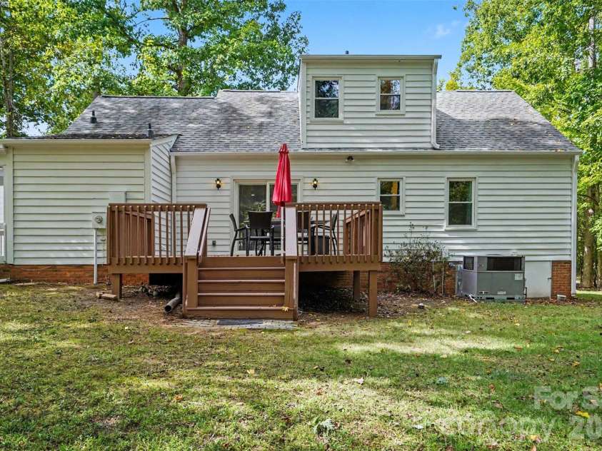 11538 Gelding Drive, Charlotte, NC 28215.  MLS# CAR4422682, YatesRealty ID 56750. Freshly stained deck and painted exterior
