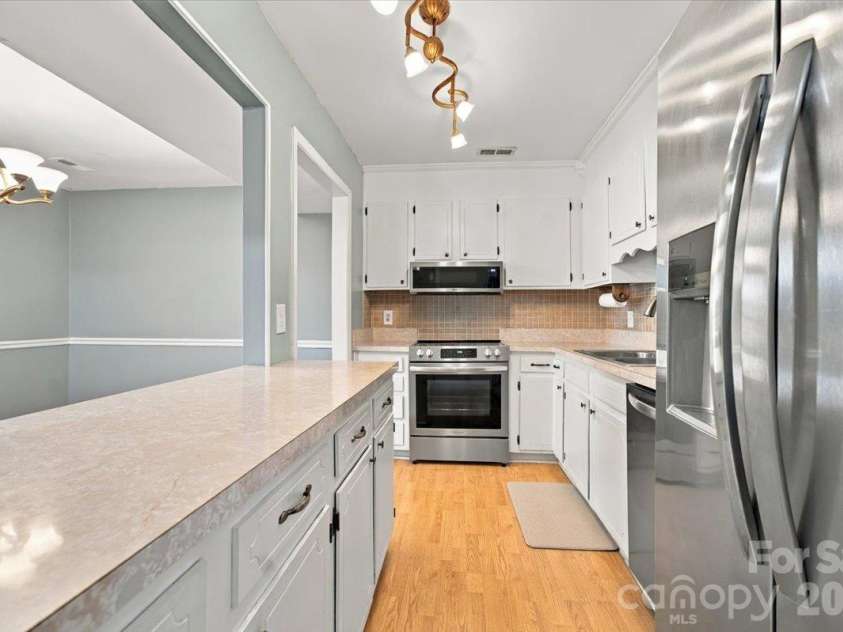 10905 Rail Tye Place, Pineville, NC 28134.  MLS# CAR4432855, YatesRealty ID 56757. 