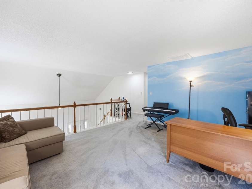 2112 Long Ridge Lane, Charlotte, NC 28214.  MLS# CAR4421277, YatesRealty ID 56764. Loft overlooking the main living area