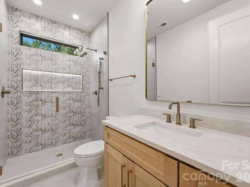 529 Kenlough Drive, Charlotte, NC 28209.  MLS# CAR4430028, YatesRealty ID 56782. Ensuite guest bathroom