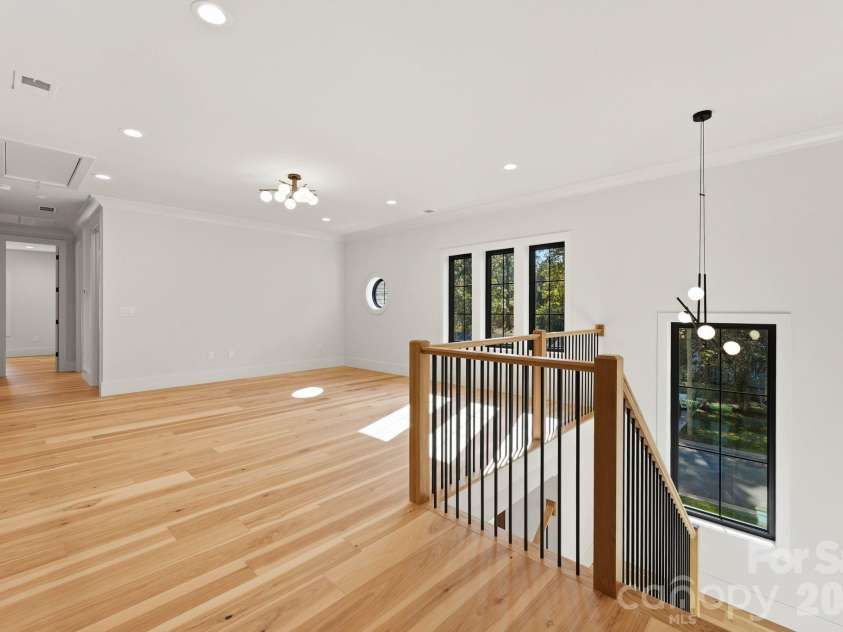 529 Kenlough Drive, Charlotte, NC 28209.  MLS# CAR4430028, YatesRealty ID 56782. Upper level landing and loft area