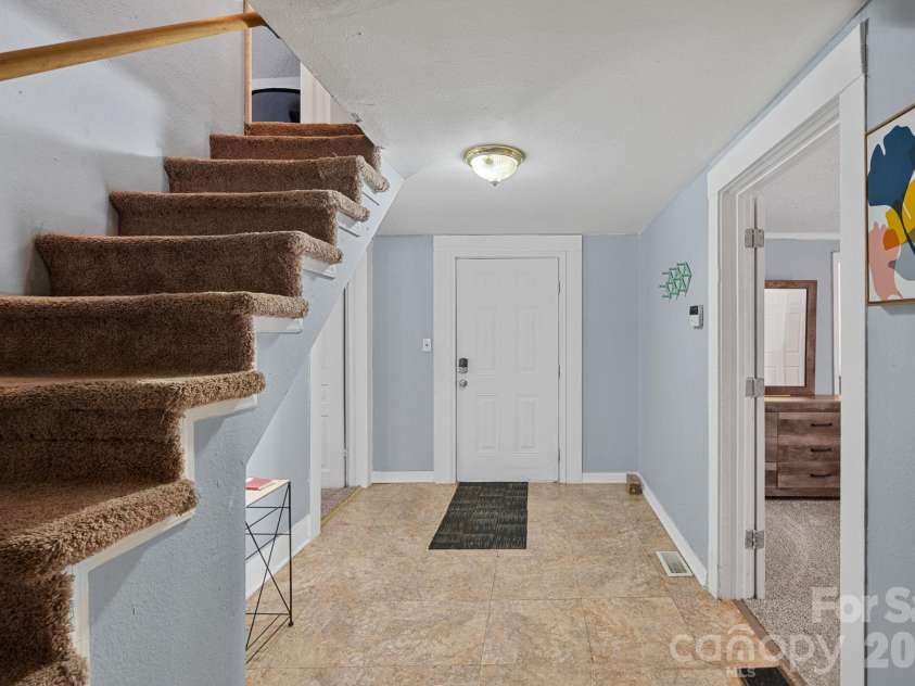 74 Meadow Avenue, Concord, NC 28025.  MLS# CAR4355867, YatesRealty ID 5679. Front door entrance