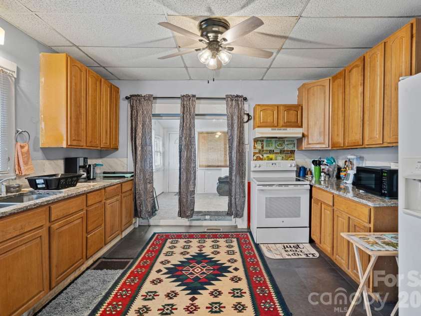 74 Meadow Avenue, Concord, NC 28025.  MLS# CAR4355867, YatesRealty ID 5679. Kitchen with granite countertops