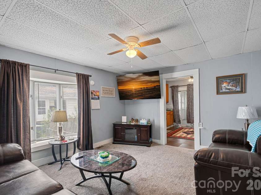 74 Meadow Avenue, Concord, NC 28025.  MLS# CAR4355867, YatesRealty ID 5679. Living room