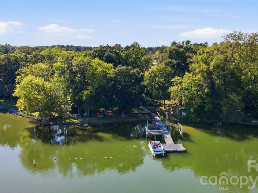1669 Aragon Beach Road, Rock Hill, SC 29732.  MLS# CAR4429104, YatesRealty ID 56795. Charming one-level waterfront home on Lake Wylie