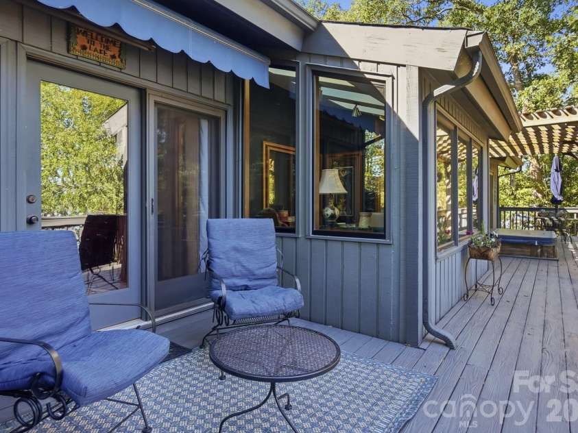 1669 Aragon Beach Road, Rock Hill, SC 29732.  MLS# CAR4429104, YatesRealty ID 56795. Expansive deck with hot tub and pergola