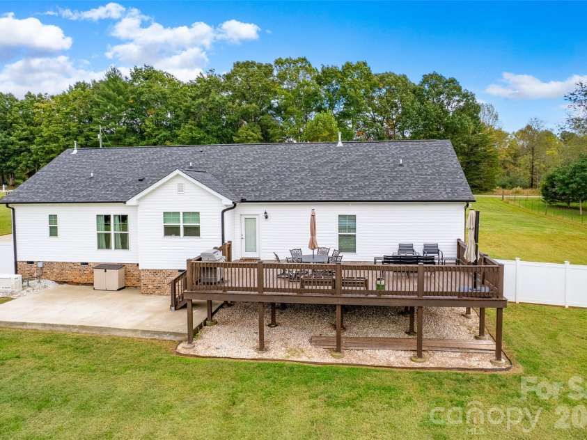 196 Treebark Road, Statesville, NC 28625.  MLS# CAR4429281, YatesRealty ID 56805. Large back deck built in 2023
