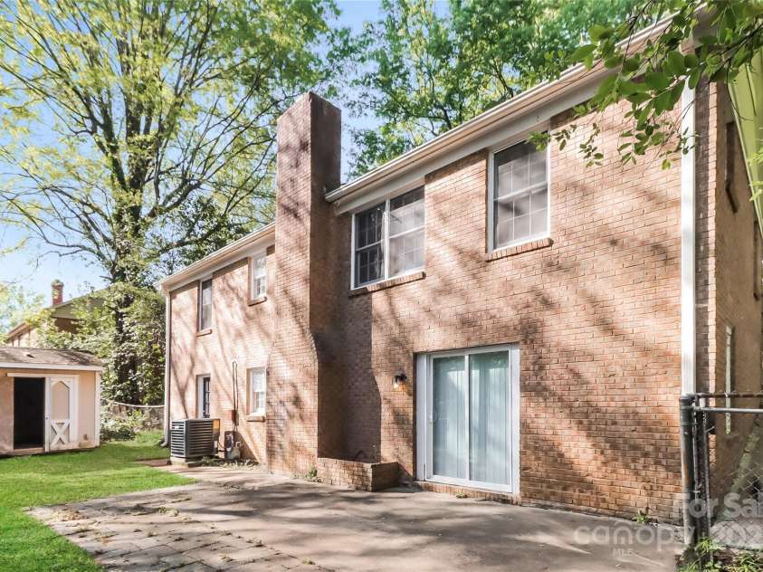 6001 Plaza Lane, Charlotte, NC 28215.  MLS# CAR4243345, YatesRealty ID 5682. Back of house